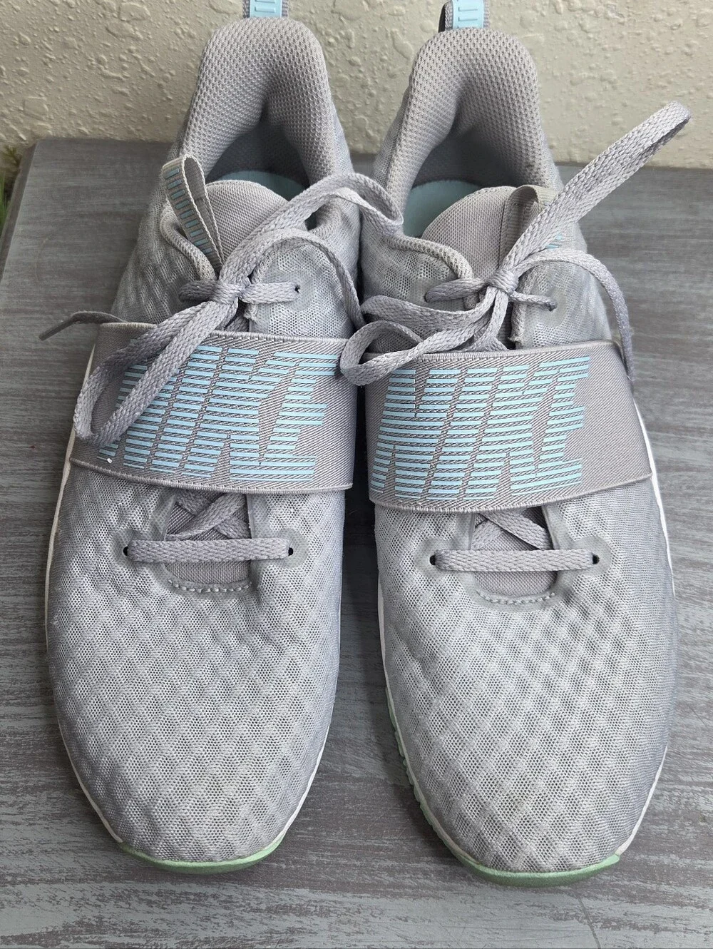 Nike Women's Grey Training Shoes with Light Blue Accents Size 9.5